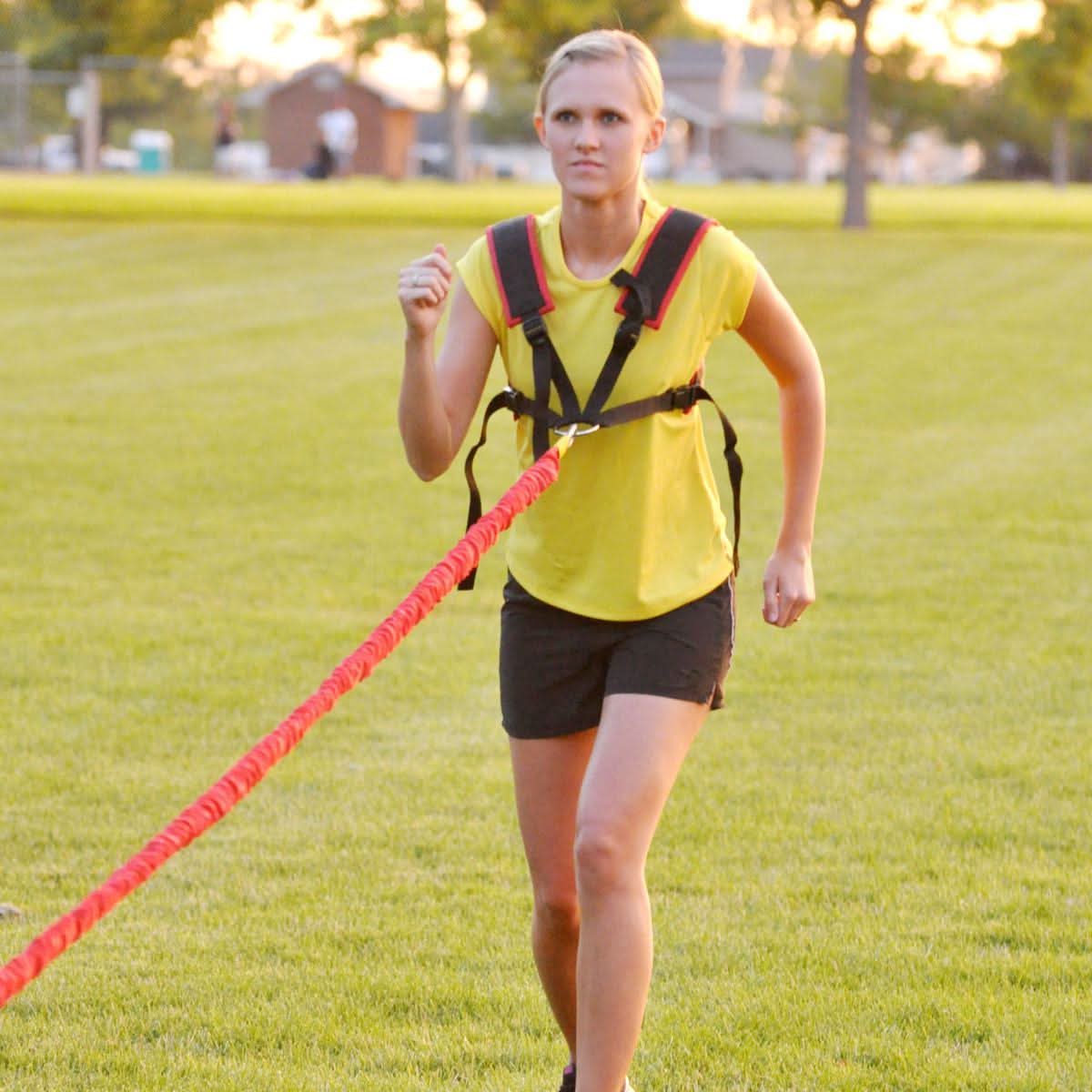 Speed training for girls baseball, rugby, softball, soccer and track and field athletes speed and overspeed training system